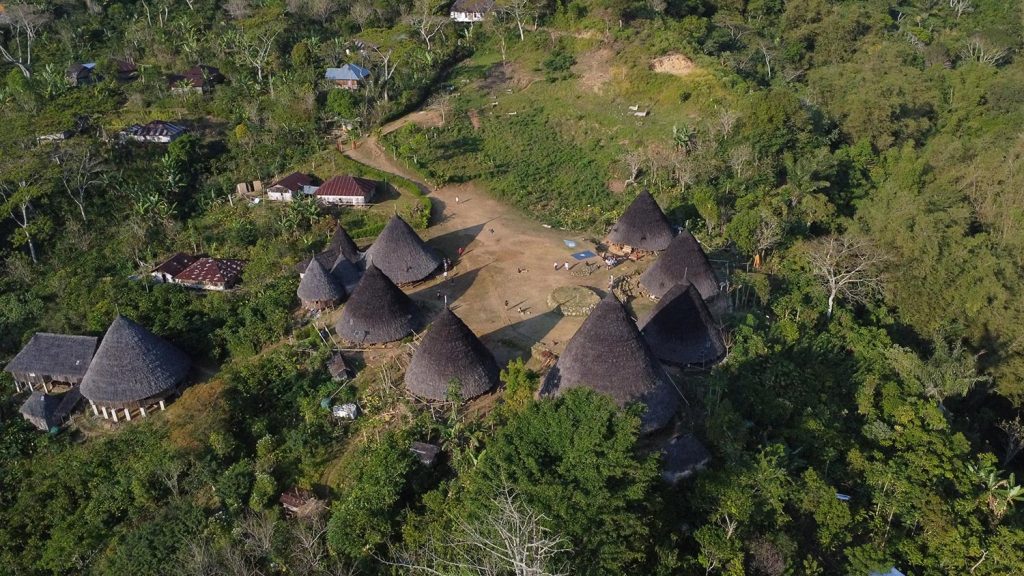 Waerebo Village with traditional Mbaru Niang houses in Flores, Indonesia
